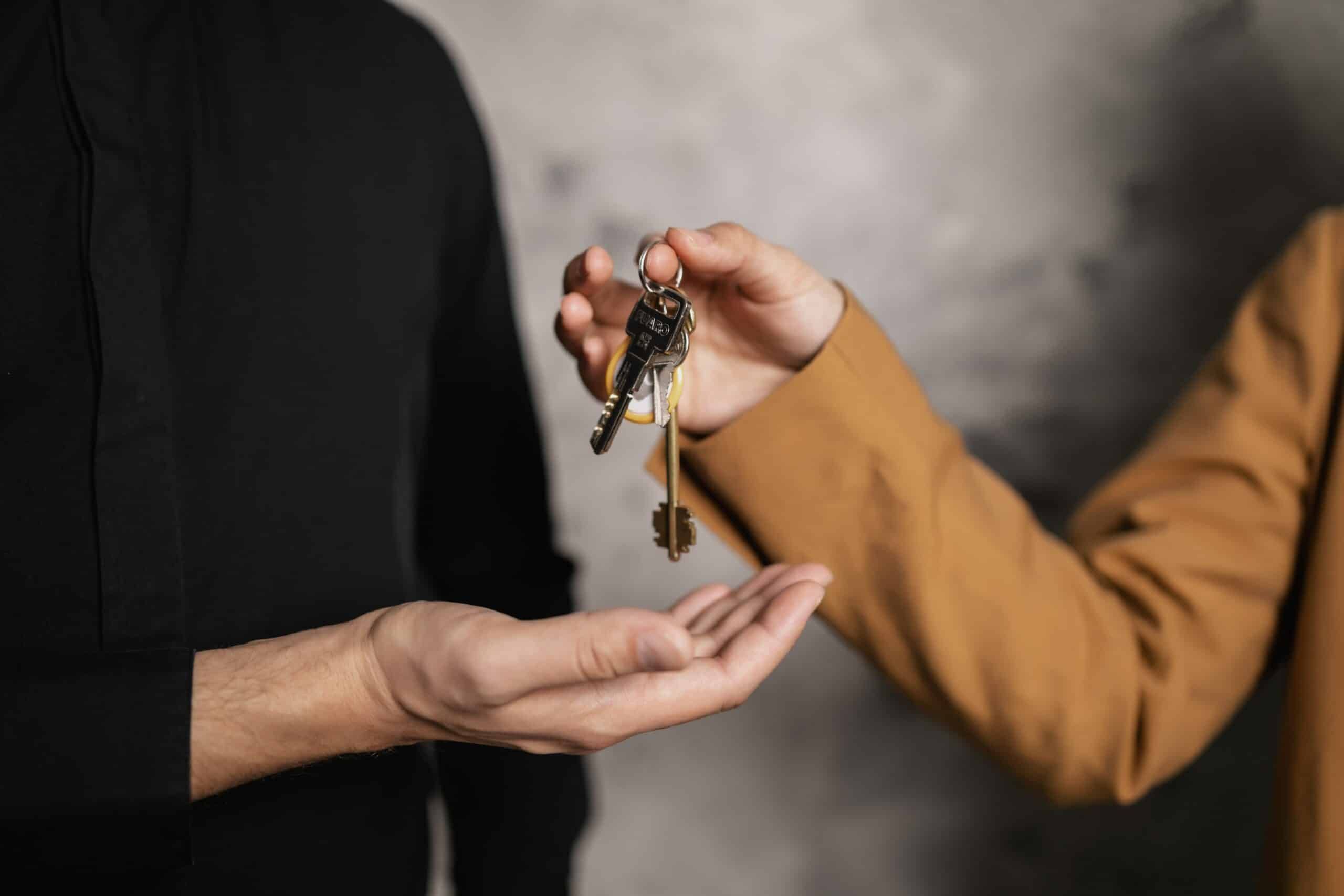 person handing another person keys, Cybersecurity, Ransomware Protection