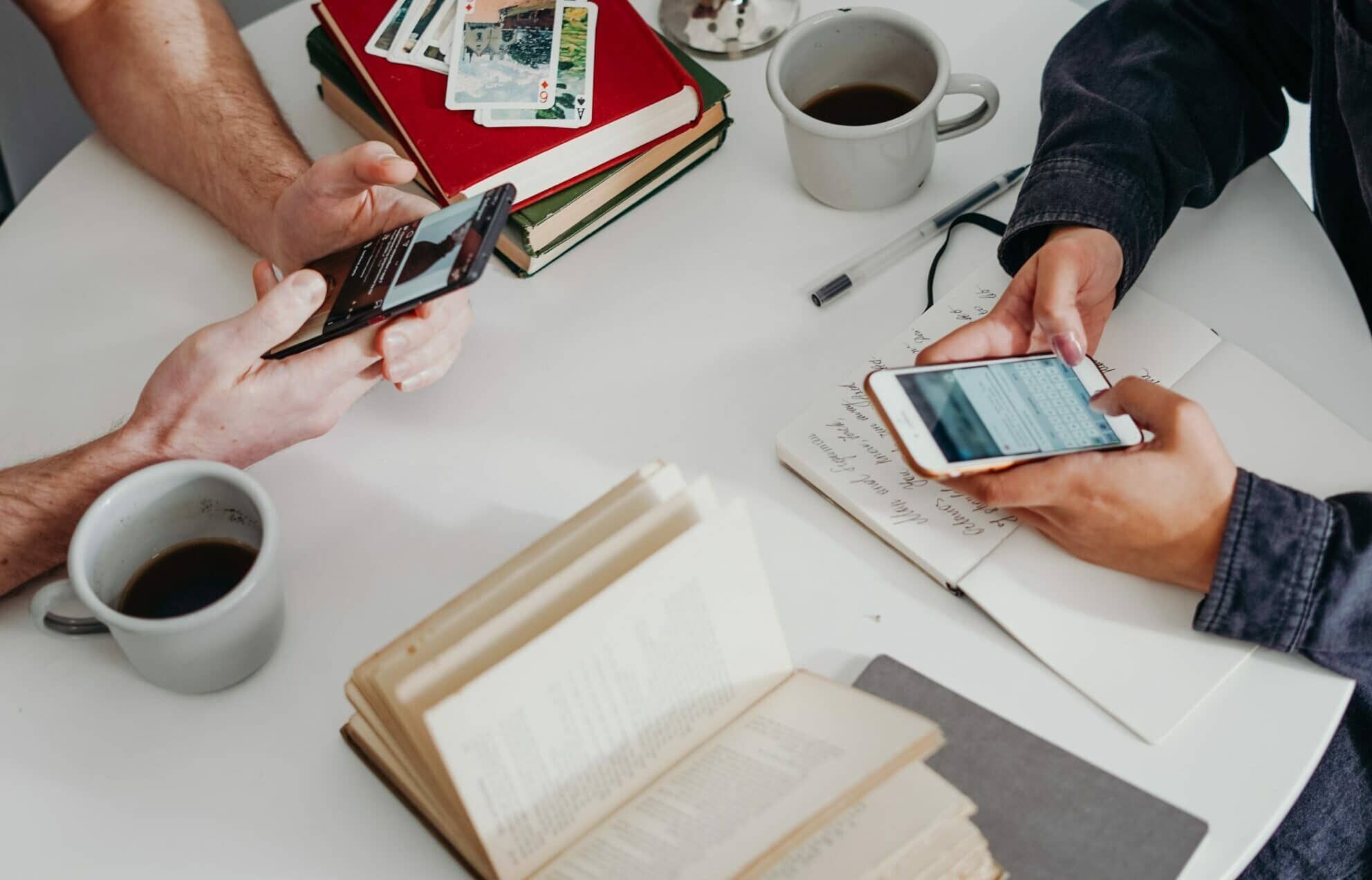 people on their cellphones - smishing, Cyberscore, cyber security companies Chicago