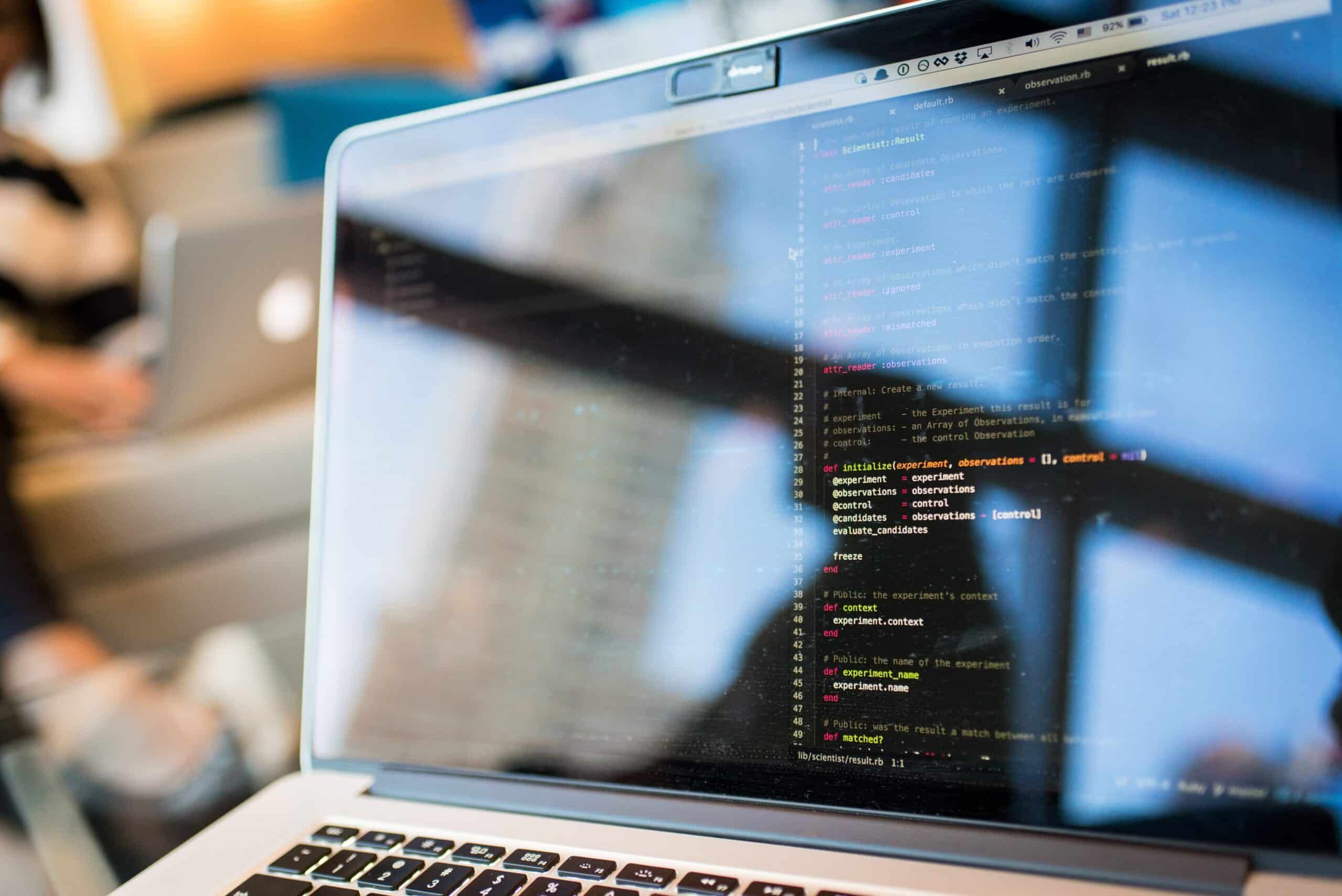 coding on laptop - EDR - Cyber Security Chicago, Cybersecurity, Ransomware Protection