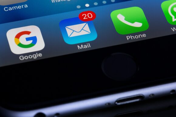 mail app on phone screen - phishing simulations