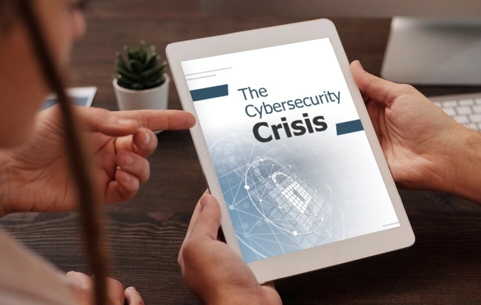 Ipad with cybersecurity newsletter on front, Cybersecurity, Ransomware Protection